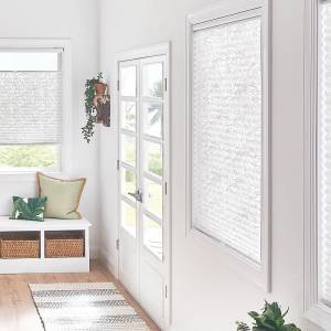 Picture of white pleated shades in a family room